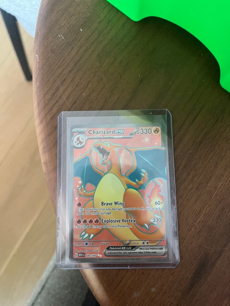 Pokémon - Charizard 183/165, Ophalen of Verzenden, Nieuw, Speelkaart(en)