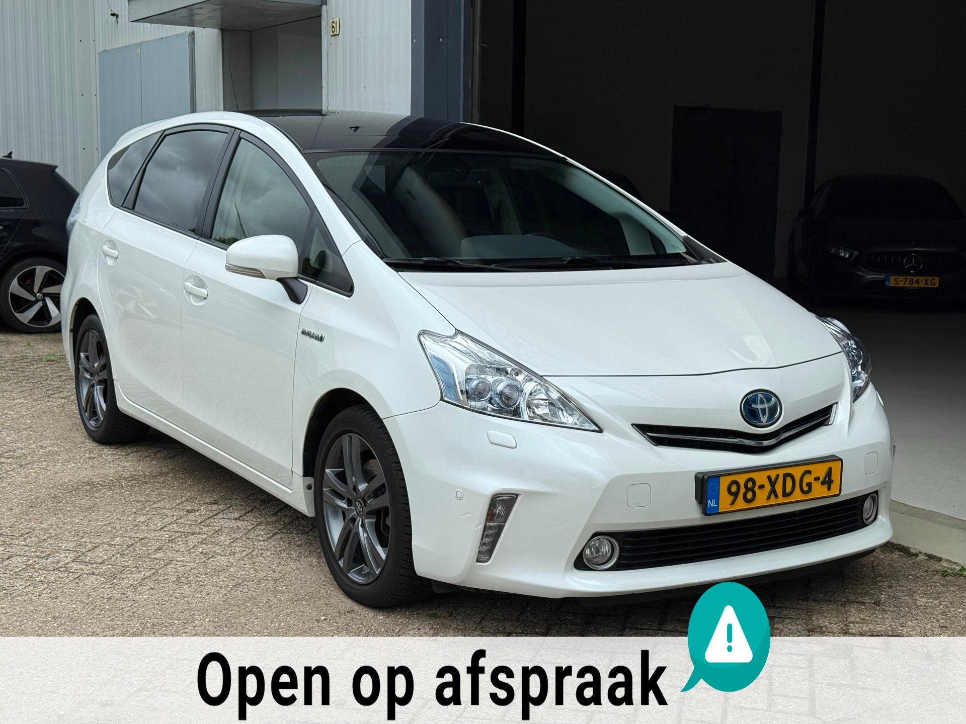 Toyota Prius Wagon 1.8 Dynamic Full Hybrid 7P Pano|NAP|Camer, Auto's, Gebruikt, Zwart, 4 cilinders, 7 stoelen