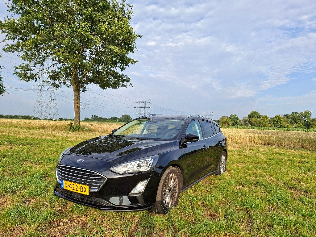 Ford Focus 1.0 Ecob. Titanium X Aut. NL 2021 Carplay Cam Nav, Auto's, Ford, 1328 kg, 125 pk, Leder en Stof, Zwart