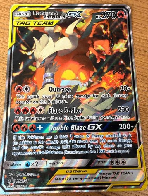 Reshiram & Charizard GX SM201 – Jumbo, Hobby en Vrije tijd, Ophalen, Zo goed als nieuw, Losse kaart