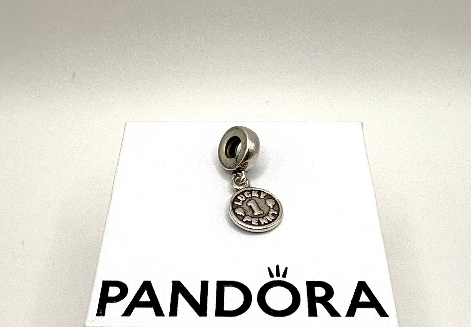 Pandora bedel Lucky Penny, Ophalen of Verzenden, Zo goed als nieuw, Zilver, Pandora