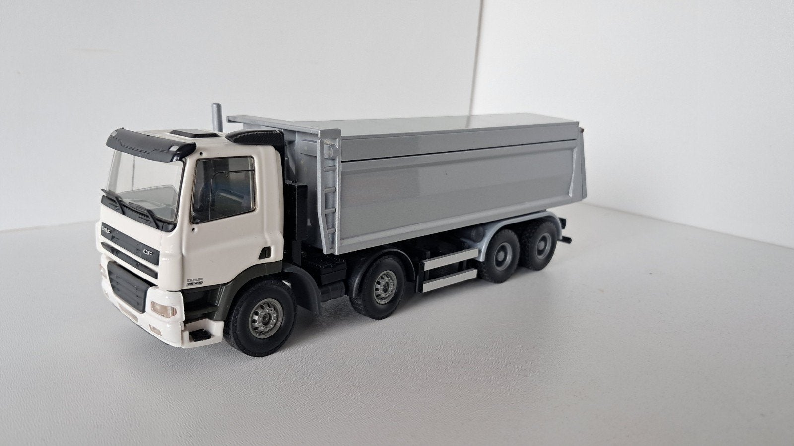 Daf CF kipper 8x4 wit tekno, Ophalen of Verzenden, Zo goed als nieuw, Bus of Vrachtwagen, Tekno
