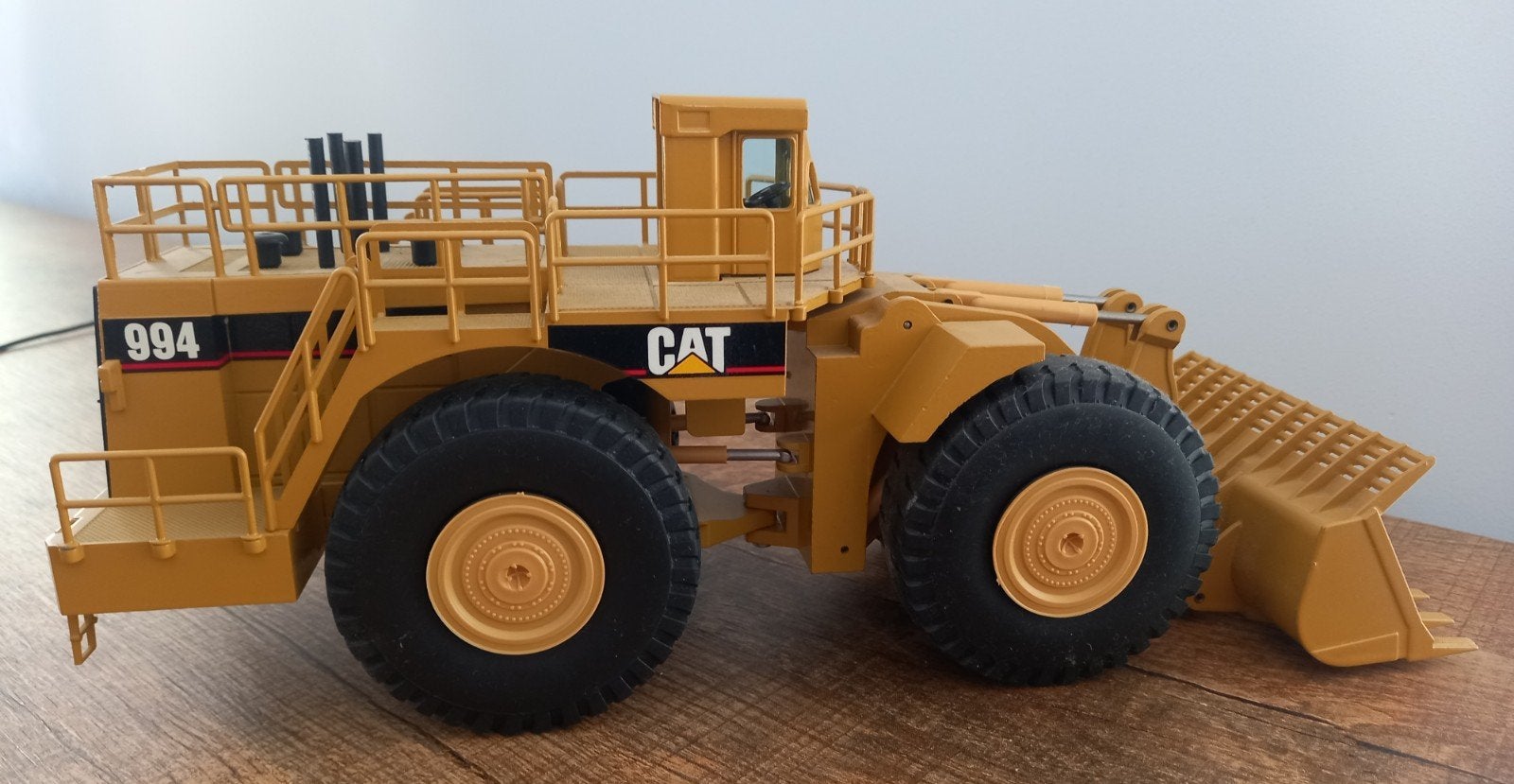 NZG Cat 994 Wiellader - Gedetailleerd schaalmodel, Ophalen of Verzenden, Zo goed als nieuw
