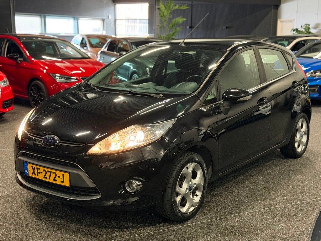 Ford Fiesta 1.25 Titanium XENON/AIRCO/CLIMATE/MULTIMEDIA/5-D, Voorwielaandrijving, Euro 5, Stof, 1242 cc