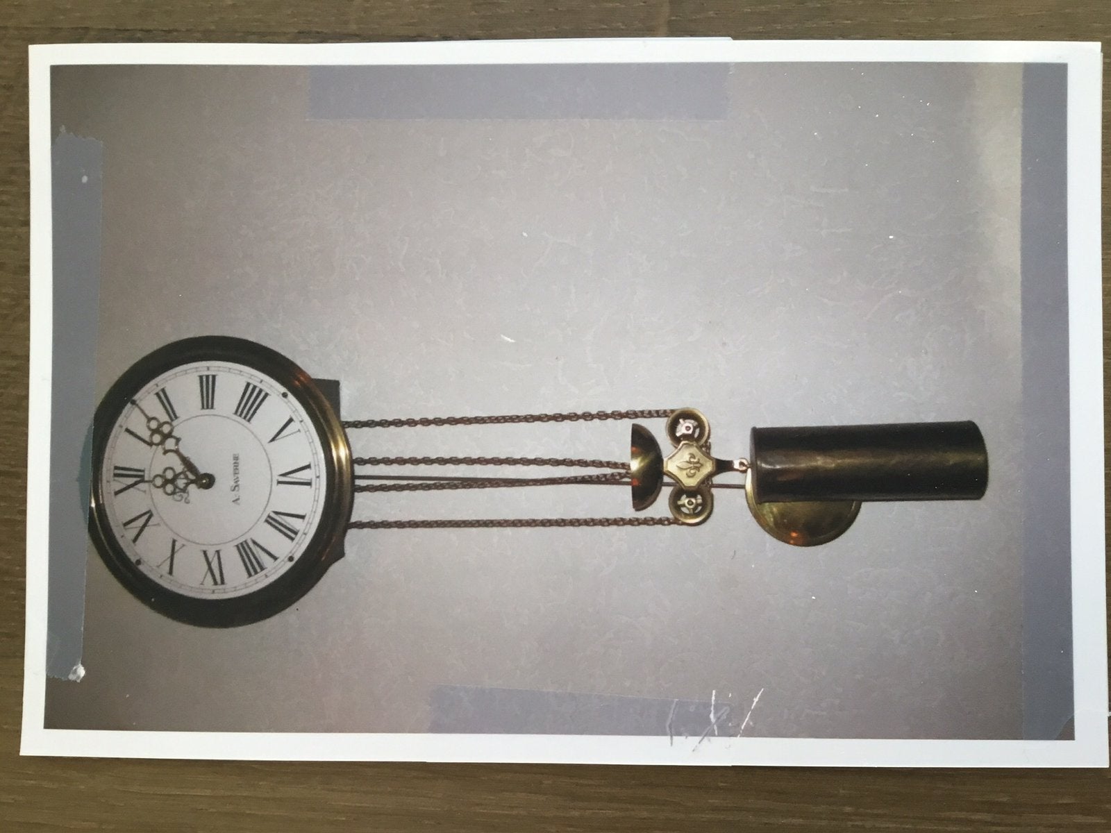 Hang/wand klok met slinger, Ophalen