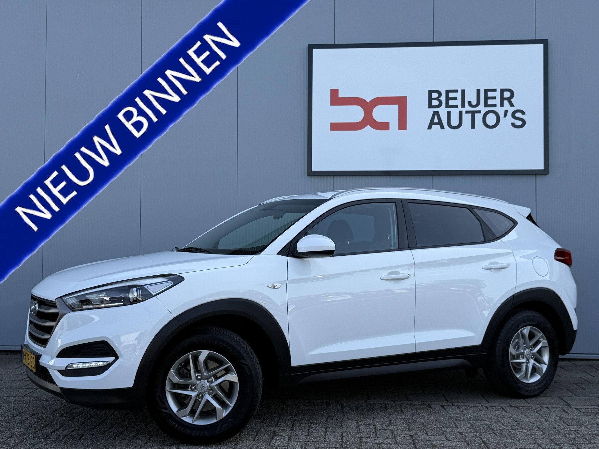 Hyundai Tucson 1.6 GDi i-Drive Trekhaak/Navi/Camera., Stof, Gebruikt, 4 cilinders, Grijs