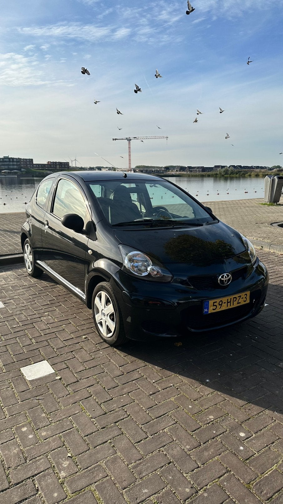 NIEUWE APK! - Toyota Aygo 1.0 12V Vvt-i 3DRS MMT 2009 Zwart, Voorwielaandrijving, 4 stoelen, Origineel Nederlands, Handgeschakeld