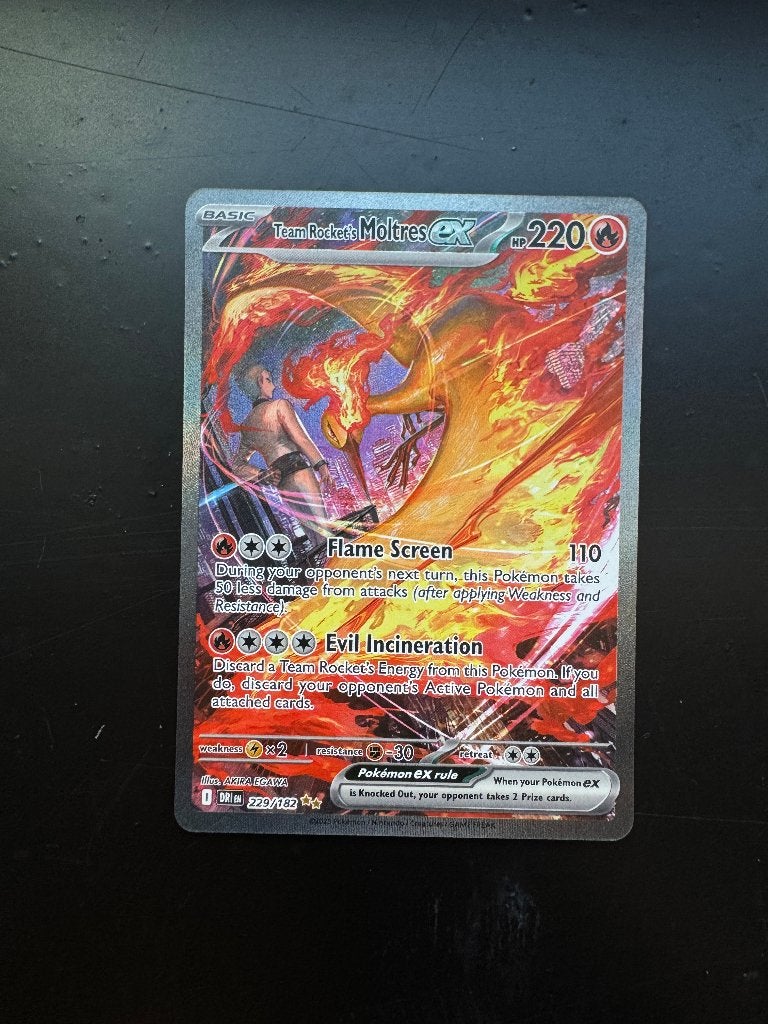 Team Rocket's Moltres DRI, Ophalen of Verzenden, Zo goed als nieuw, Losse kaart, Foil