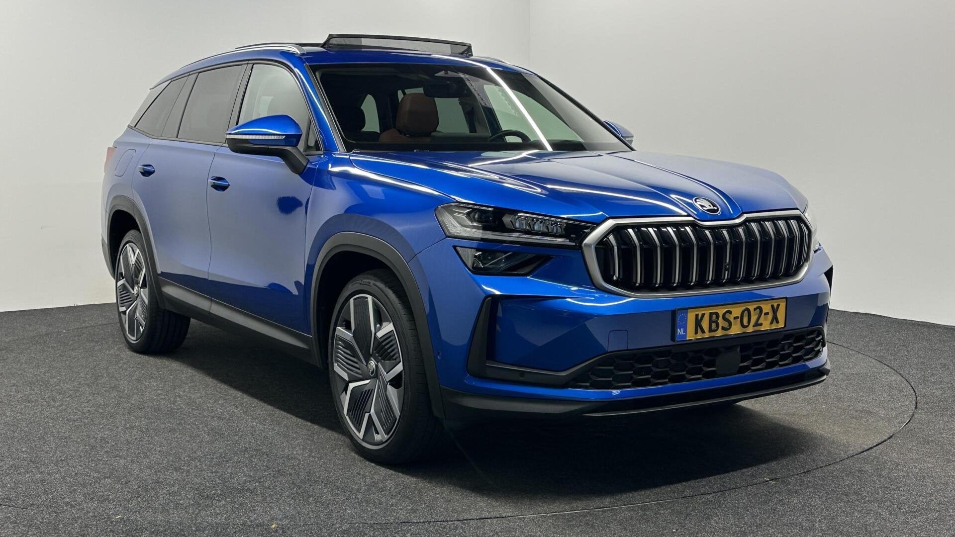 Skoda Kodiaq 1.5 TSI PHEV Sportline Business|Leer|Pano|Head, Auto's, Skoda, 4 cilinders, Met garantie (alle), Blauw, Leder