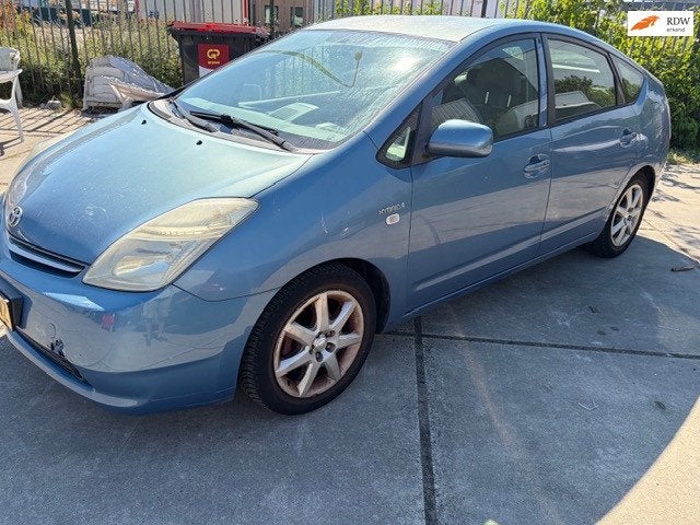 Toyota Prius 1.5 VVT-i airco navigatie, Auto's, Toyota, Gebruikt, 4 cilinders, Blauw, 23 km/l
