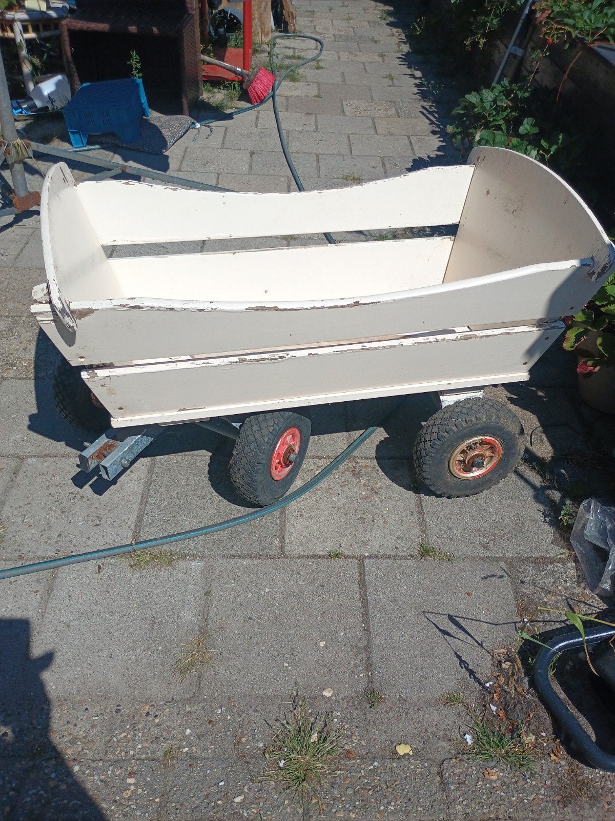 Houten bolderkar met opknapbeurt nodig, Ophalen