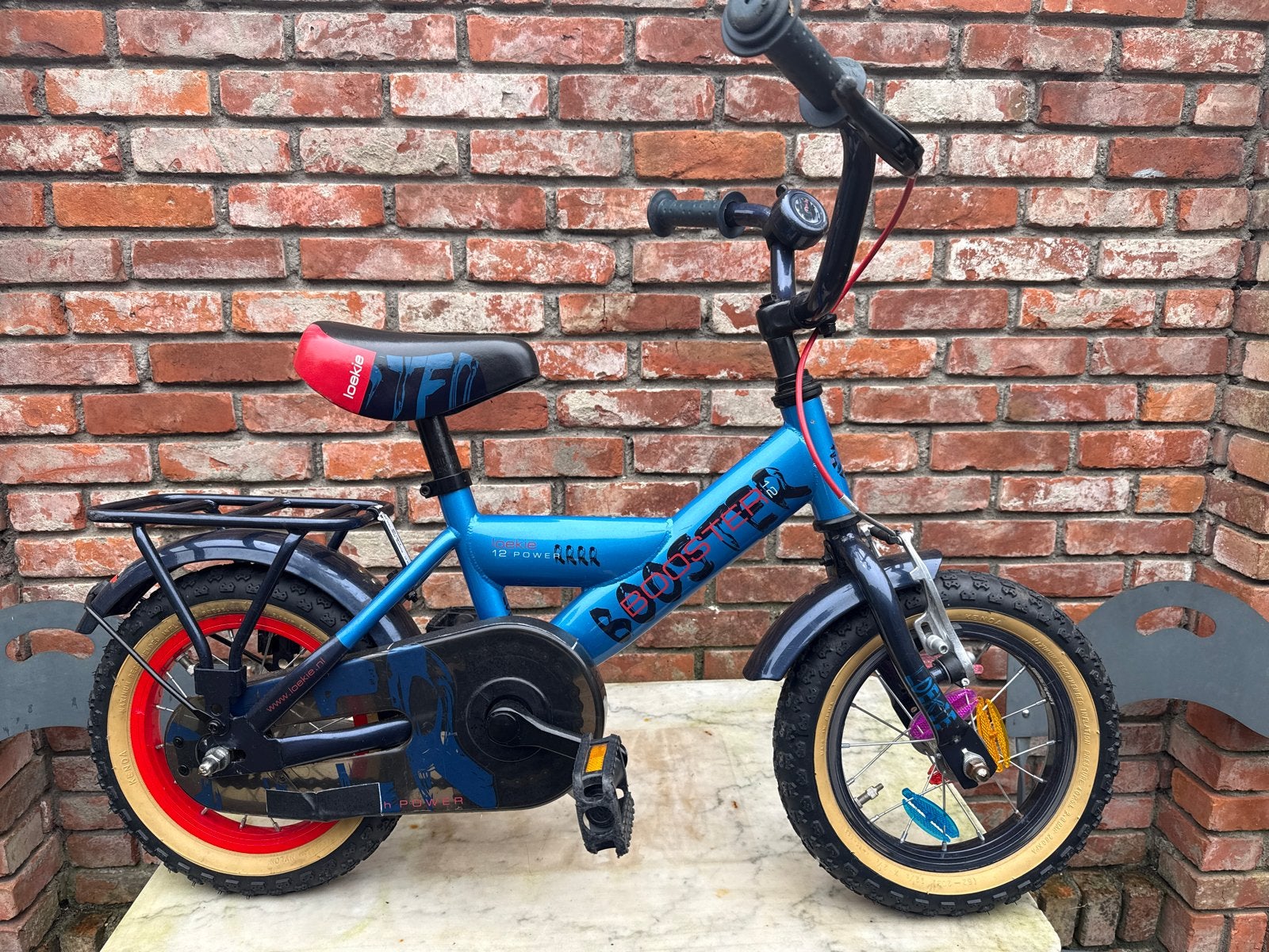 Loekie Booster kinderfiets 12 inch - in goede staat, Fietsen en Brommers, Ophalen, Terugtraprem, Zijwieltjes, Minder dan 16 inch