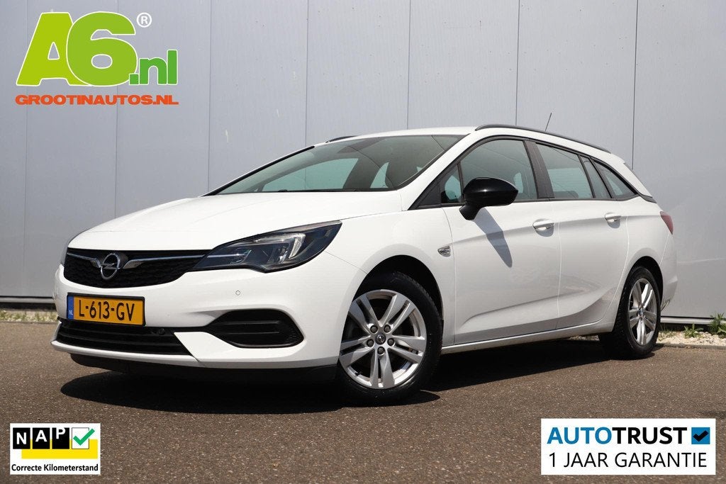 Opel Astra Sports Tourer 1.2 Edition 110PK Trekhaak Navigati, Auto's, Stof, Gebruikt, 1199 cc, Met garantie (alle)
