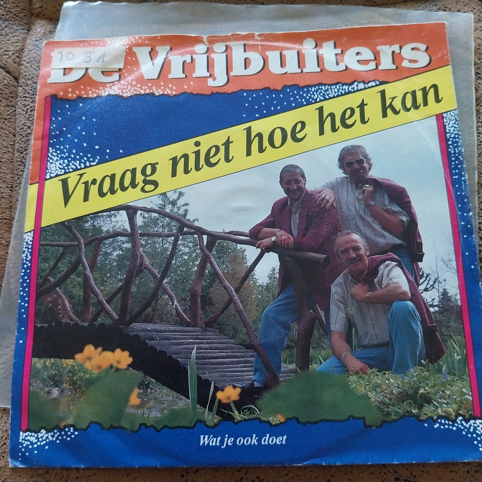 De Vrijbuiters - Vraag niet hoe het kan (Vinyl Single), Gebruikt, Fotohoes, 7 inch, Ophalen of Verzenden