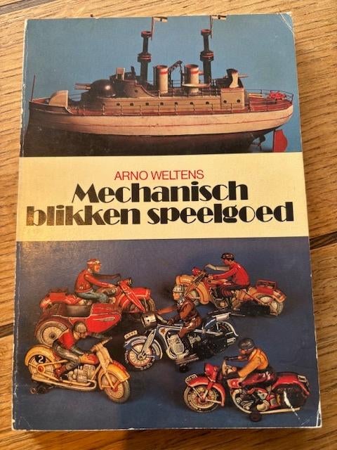 Mechanisch blikken speelgoed, Ophalen of Verzenden, Gelezen, Arno Weltens