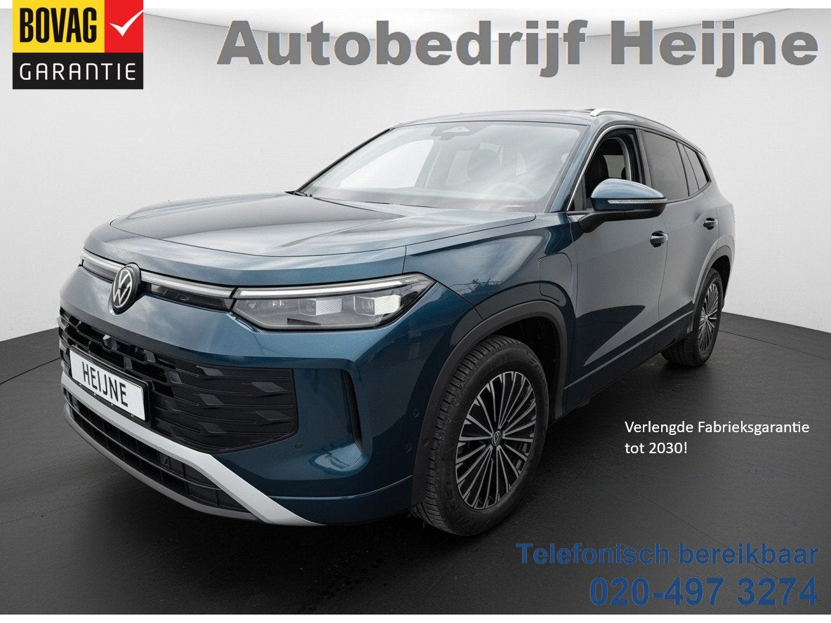 Volkswagen Tayron 1.5 204PK eHybrid DSG LIFE 360°CAMERA/TRE, Auto's, 12 maanden, 4 cilinders, Blauw, Bedrijf