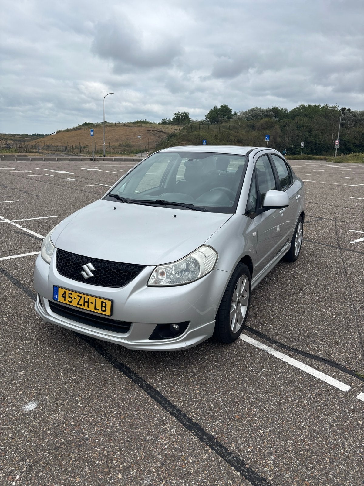 Suzuki SX4 1.6 4DRS 2008 Grijs, 15 km/l, 4 cilinders, 49 €/maand, Origineel Nederlands