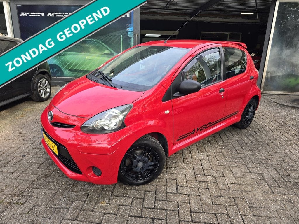 Toyota Aygo 1.0 VVT-i Comfort | 2E EIGENAAR | 12MND GARANTIE, Voorwielaandrijving, Euro 5, Gebruikt, Leder en Stof