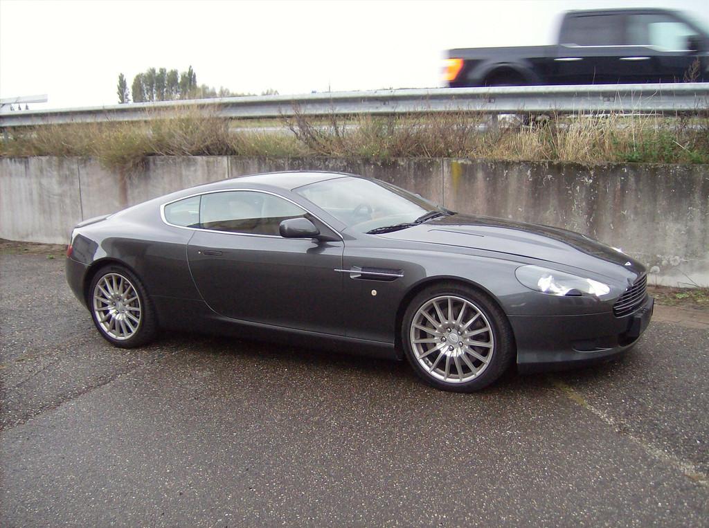 Aston Martin Db9 5.9 V12 COUPE AUT Lichte voorschade, Auto's, Aston Martin, Automaat, 5935 cc, 12 cilinders, 6 km/l