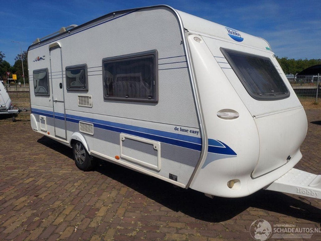 Hobby 495 UL Mover Enkele bedden hagelschade 5950 euro, Mover, Rondzit, Hobby, Bedrijf