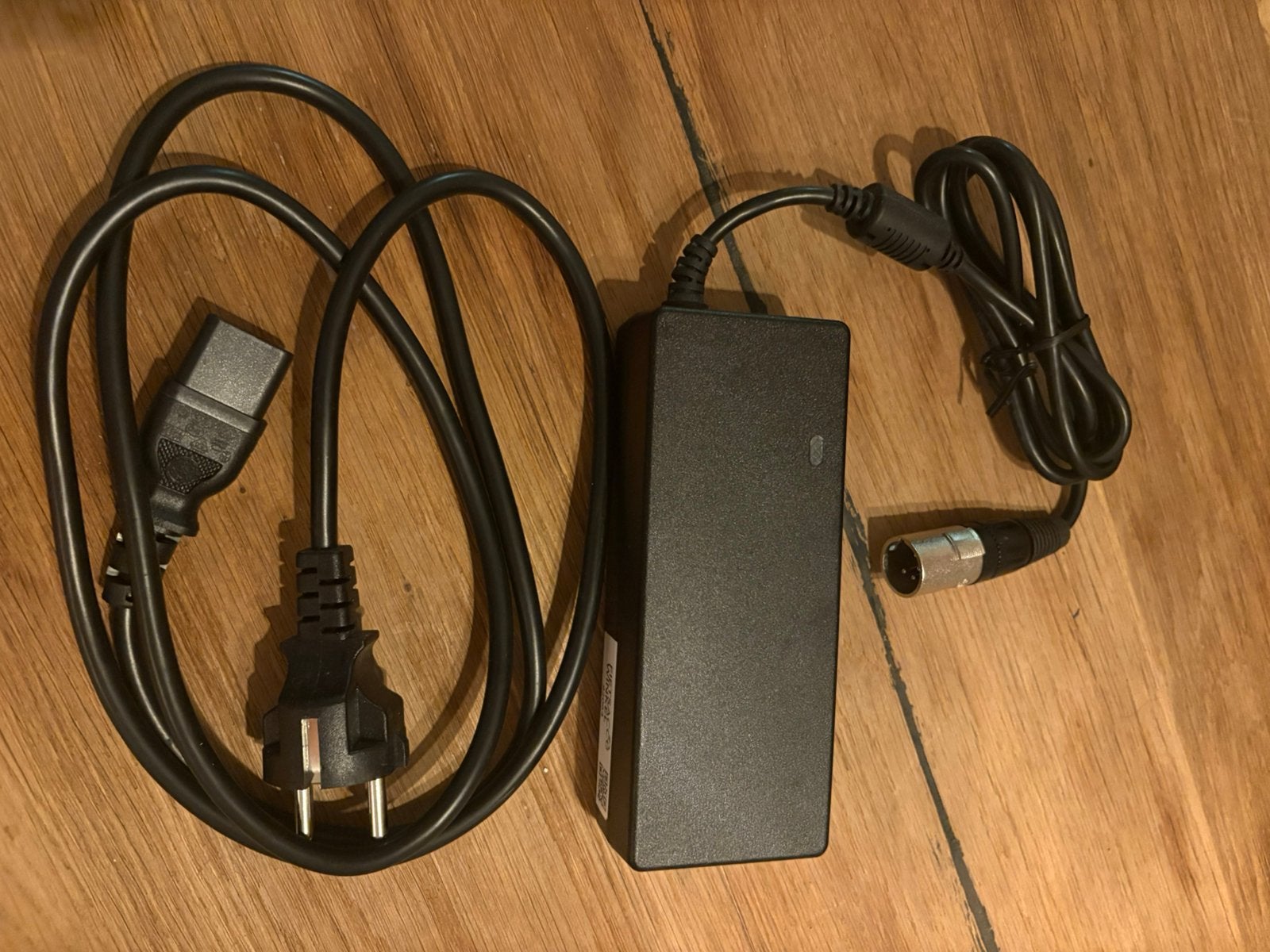 Lader Sparta/Batavus/Koga 4 pins PMU 36V, Zo goed als nieuw