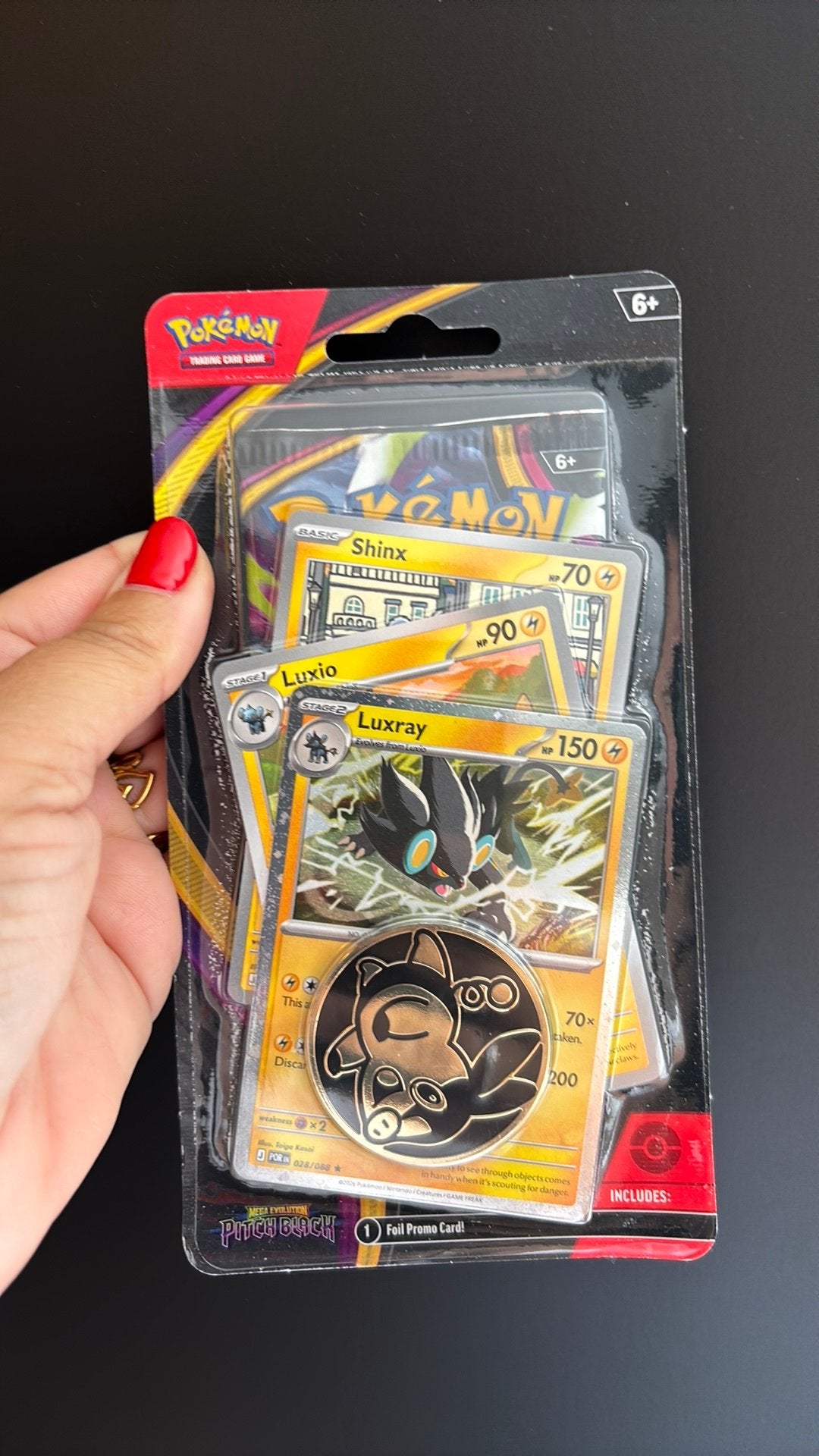 Black pitch pokemon set met promo kaart en munt, Ophalen of Verzenden, Zo goed als nieuw