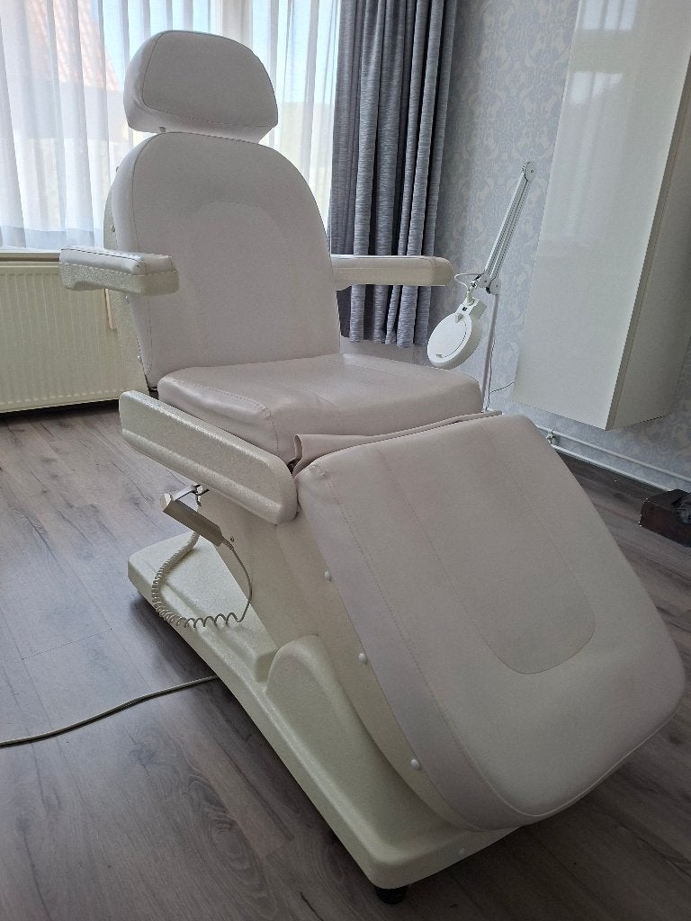 Elektrische behandelstoel / massagetafel, Ophalen