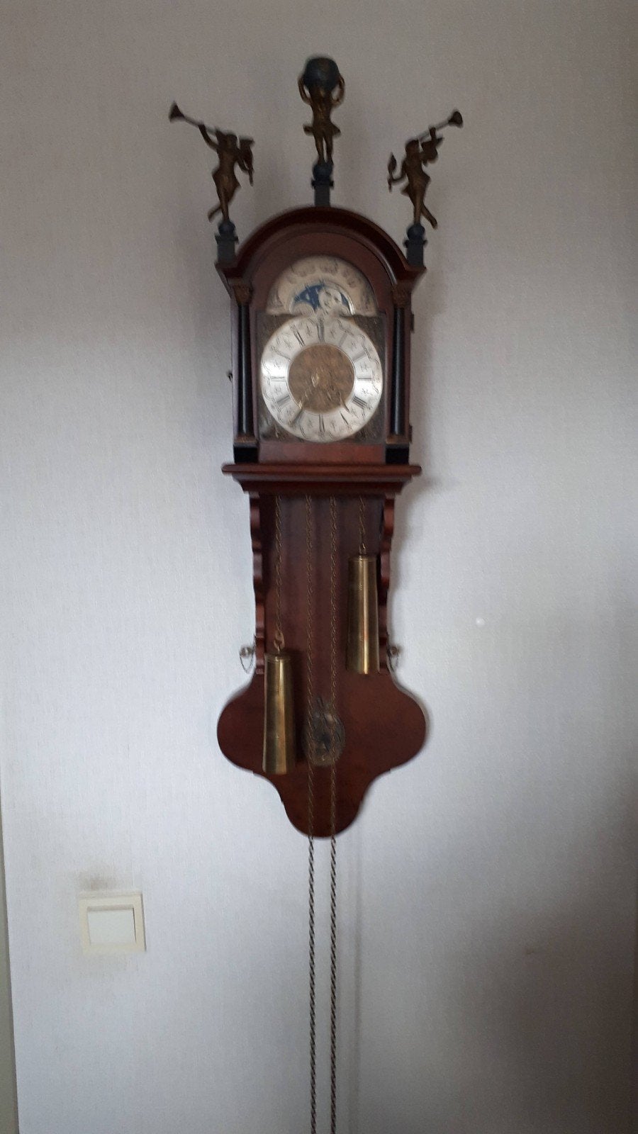Wandklok, Ophalen