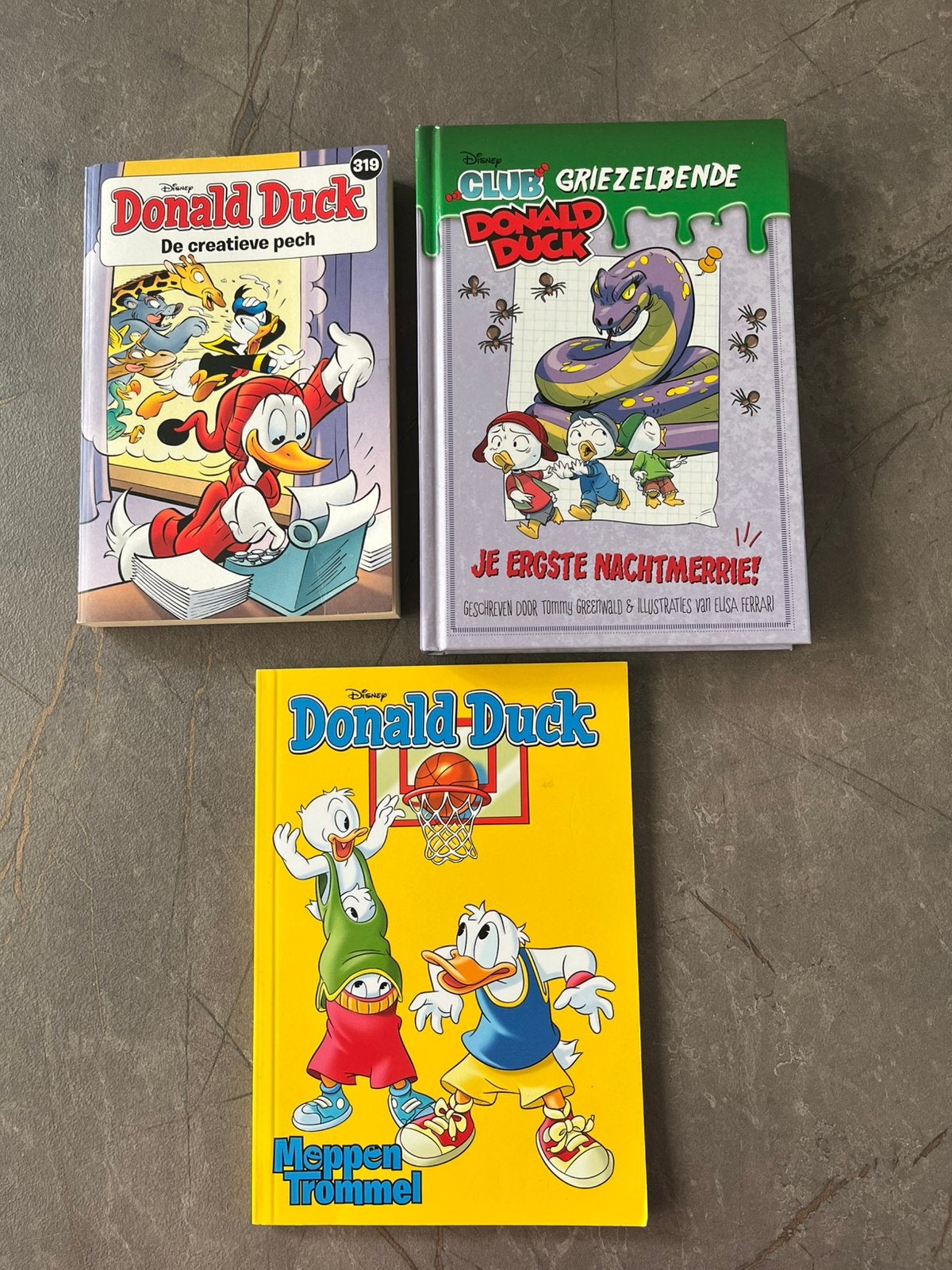 Donald Duck boek, pocket nr.319 en moppentrommel, Ophalen of Verzenden, Zo goed als nieuw, Verhalen