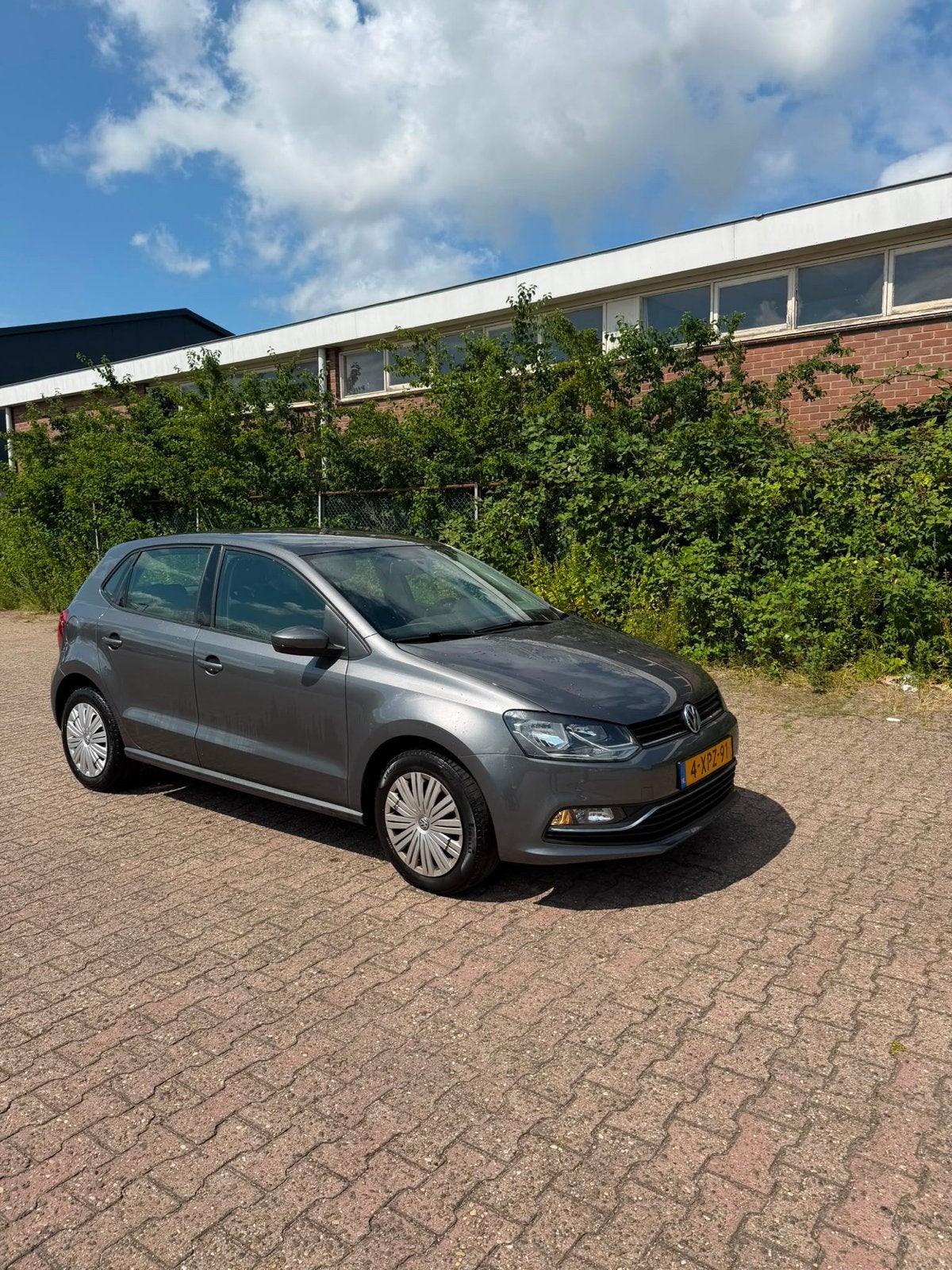 Volkswagen Polo 1.2 TSI 66KW 2014 Grijs, Auto's, Volkswagen, 40 €/maand, 4 cilinders, Origineel Nederlands, Handgeschakeld