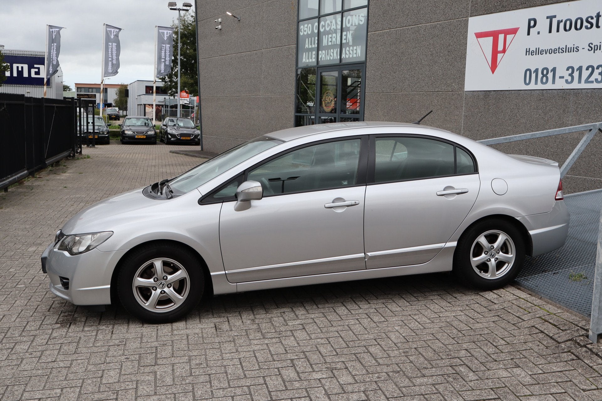 Honda Civic 1.3 Hybrid Automaat/NL Auto/Stoelverwarming/Crui, Auto's, Stof, Gebruikt, Zwart, Origineel Nederlands