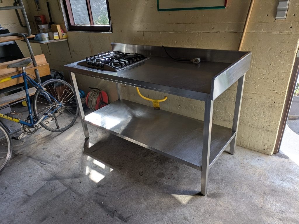 inox tafel met gasvuur (kan weg) - H 1m- L 1m60- D 70 - 400€, Ophalen, Gebruikt, 100 tot 150 cm, 150 tot 200 cm
