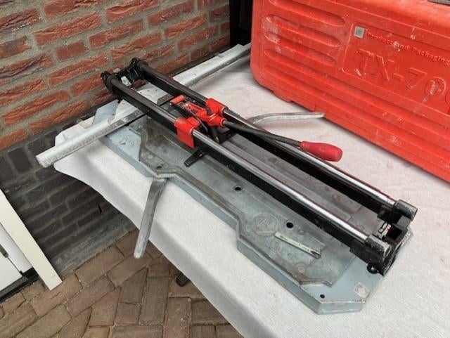rubi tx 700 tegelsnijder, Ophalen