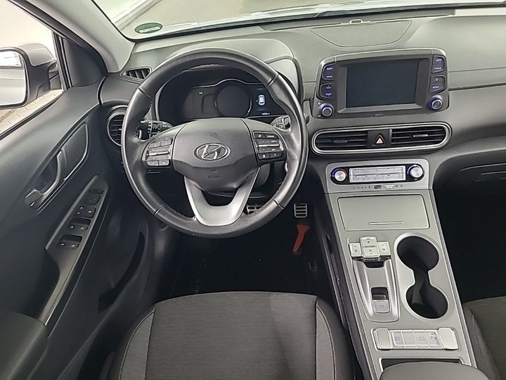 Hyundai KONA EV Comfort 64 kWh 1e-Eig. & Dealer-Onderh BOVAG, Auto's, Stof, Gebruikt, Zwart, Origineel Nederlands