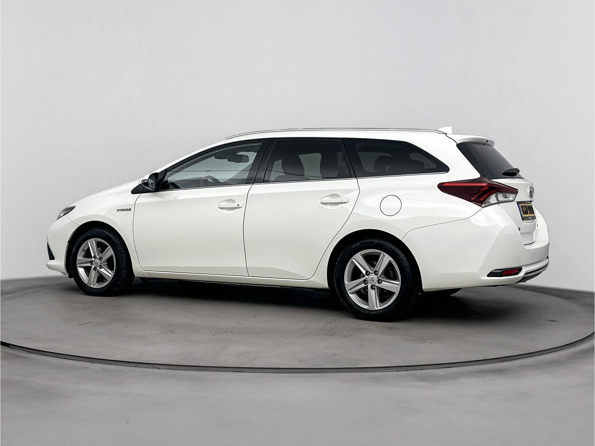 Toyota Auris Touring Sports 1.8 Hybrid Dynamic Go | Lichtmet, Auto's, 12 maanden, Gebruikt, Wit, Hybride Elektrisch/Benzine