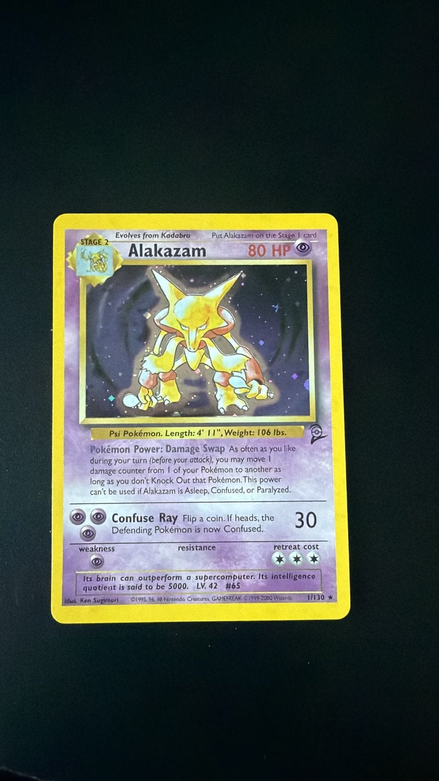 Pokemon Alakazam Base Set 1/102 Holo Rare, Ophalen of Verzenden, Zo goed als nieuw, Losse kaart