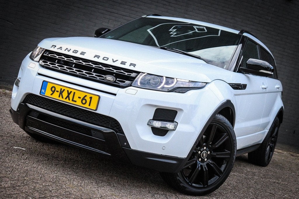 Land Rover Range Rover Evoque 2.0 Si 4WD Prestige Net binnen, Auto's, Land Rover, Automaat, Stof, Zwart, 4 cilinders