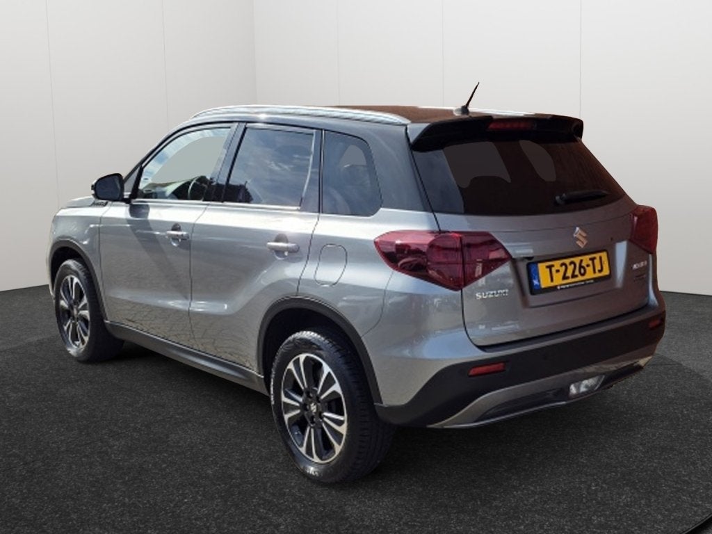 Suzuki Vitara 1.5 Hybrid Style Automaat Navigatie Clima Came, Auto's, Gebruikt, Euro 6, 4 cilinders, 400 kg