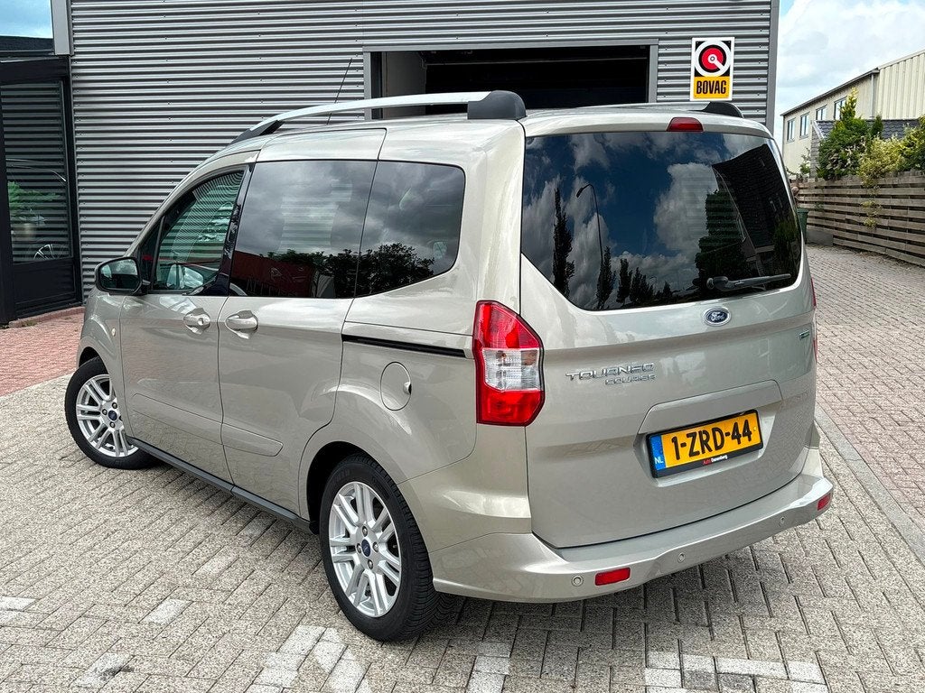 Ford Tourneo Courier 1.0 Titanium Stoelverwarming, Garantie, Auto's, Voorwielaandrijving, Euro 5, Gebruikt, Zwart