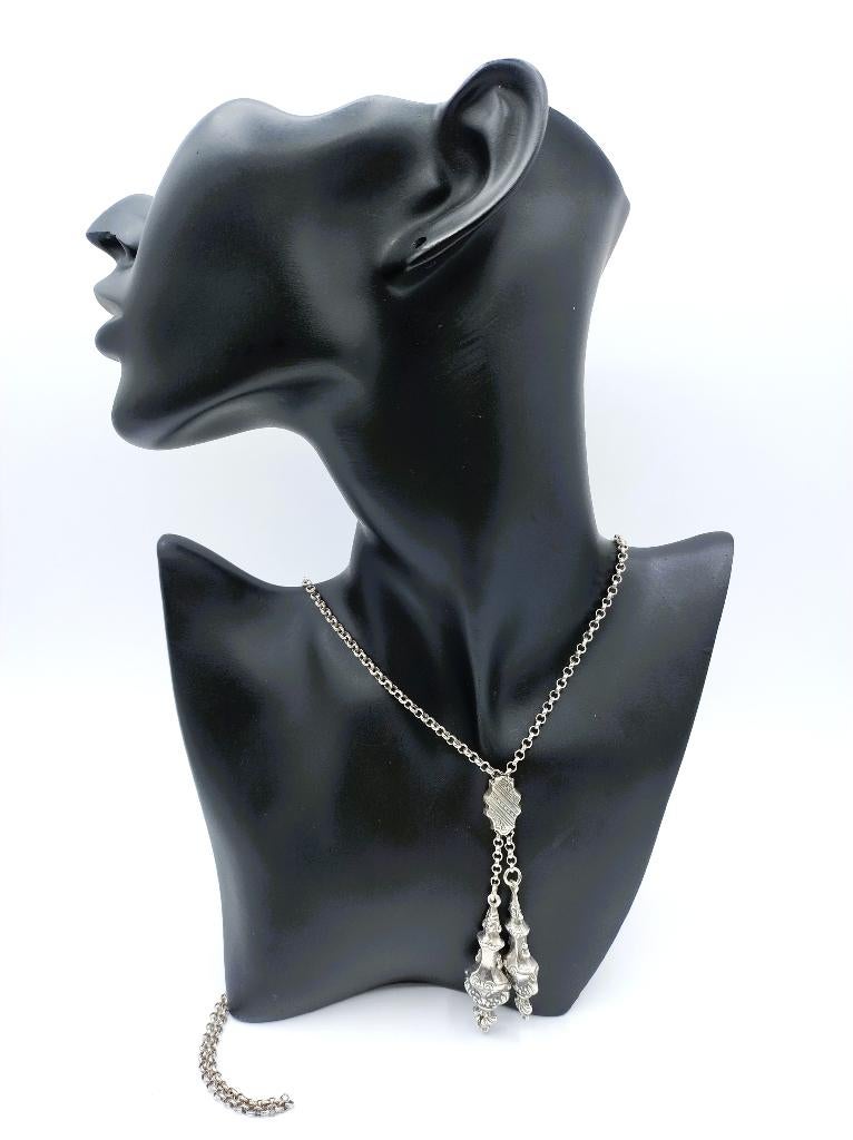 Zilveren jasseronketting met breipendoppen, 90 cm.