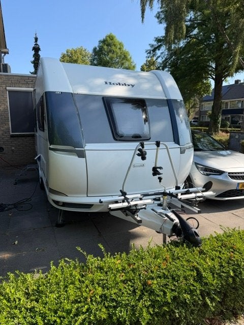 Caravan Hobby 460UFE Deluxe 2021 zo goed als nieuw, Ringverwarming, Rondzit, Hobby, Frans bed