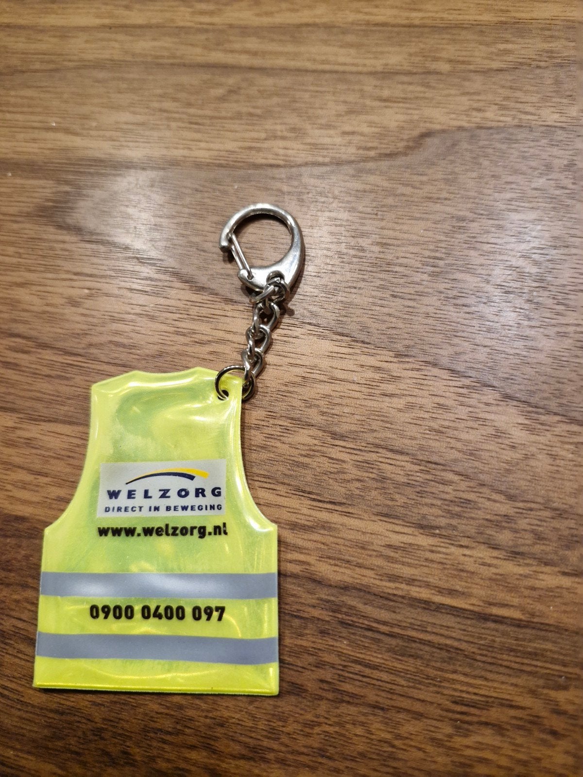 555 Welzorg reflecterende sleutelhanger, Ophalen of Verzenden, Zo goed als nieuw, Overige typen