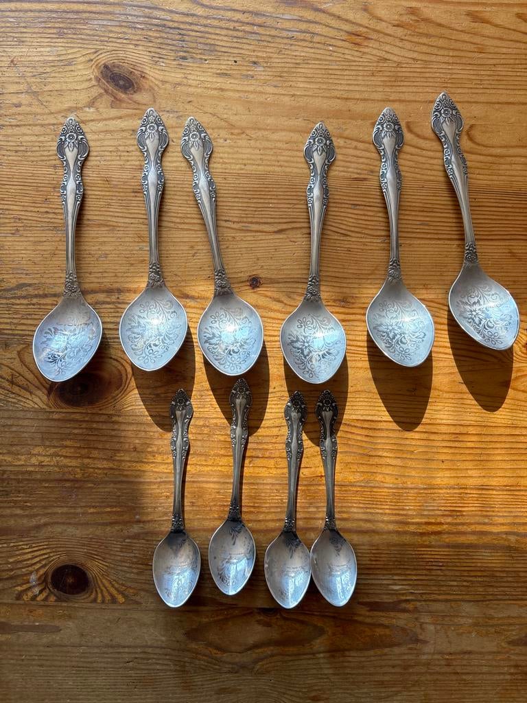 Set van 9 zilverkleurige lepels met bloemmotief HEP, Ophalen of Verzenden