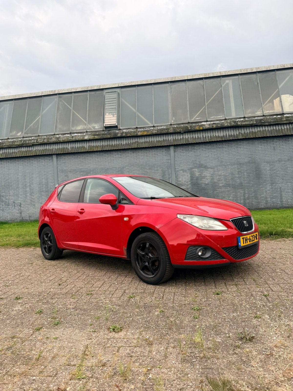 Seat Ibiza 1.6 77KW 5DRS 2008 Rood, Auto's, Voorwielaandrijving, 15 km/l, 40 €/maand, 4 cilinders