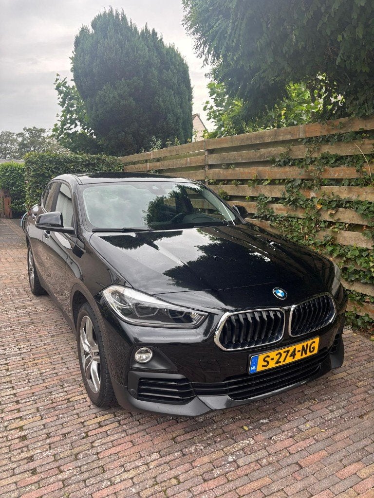 BMW X2 sDrive18i Automaat | 148.000 km | 2018 | Hagelschade, Zwart, Particulier, 3 cilinders, Bluetooth