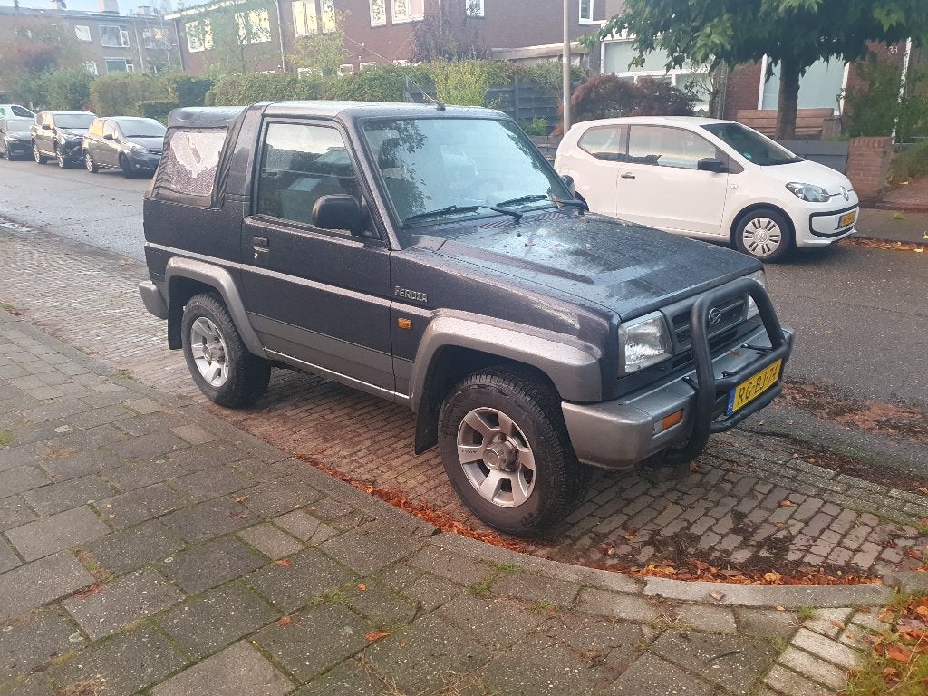 Daihatsu Feroza 1.6 I Resintop 4WD 1997 Grijs, Auto's, Feroza, Stof, 1590 cc, Origineel Nederlands