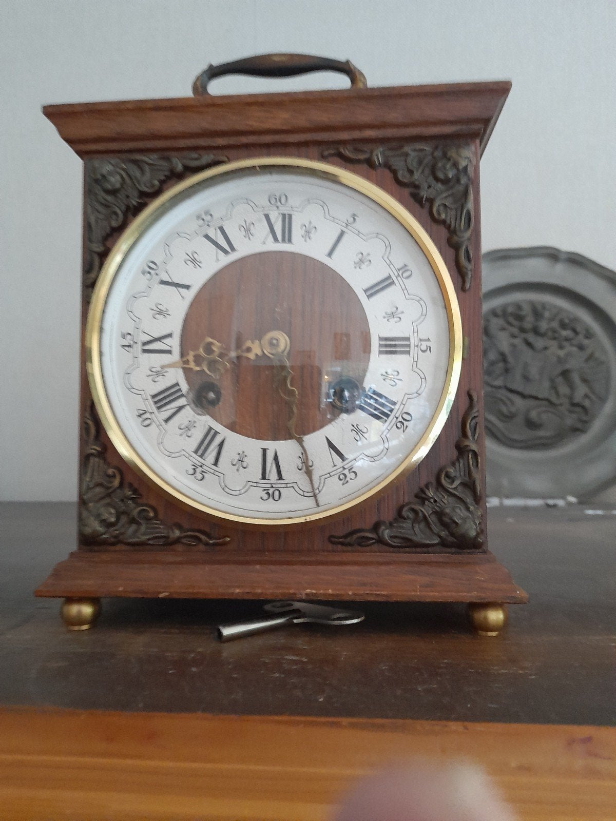 oude kleine pendule, Ophalen
