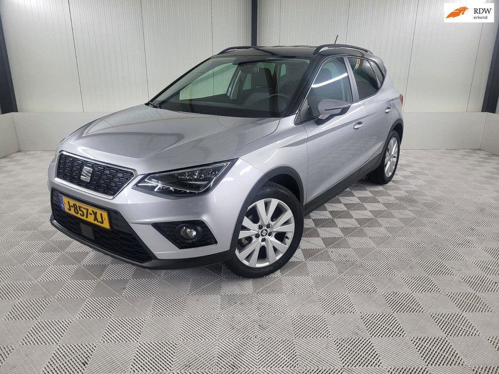 Seat Arona 1.0 TSI Style Limited Edition, Camera, Carplay, Auto's, Stof, Gebruikt, 1064 kg, 49 €/maand