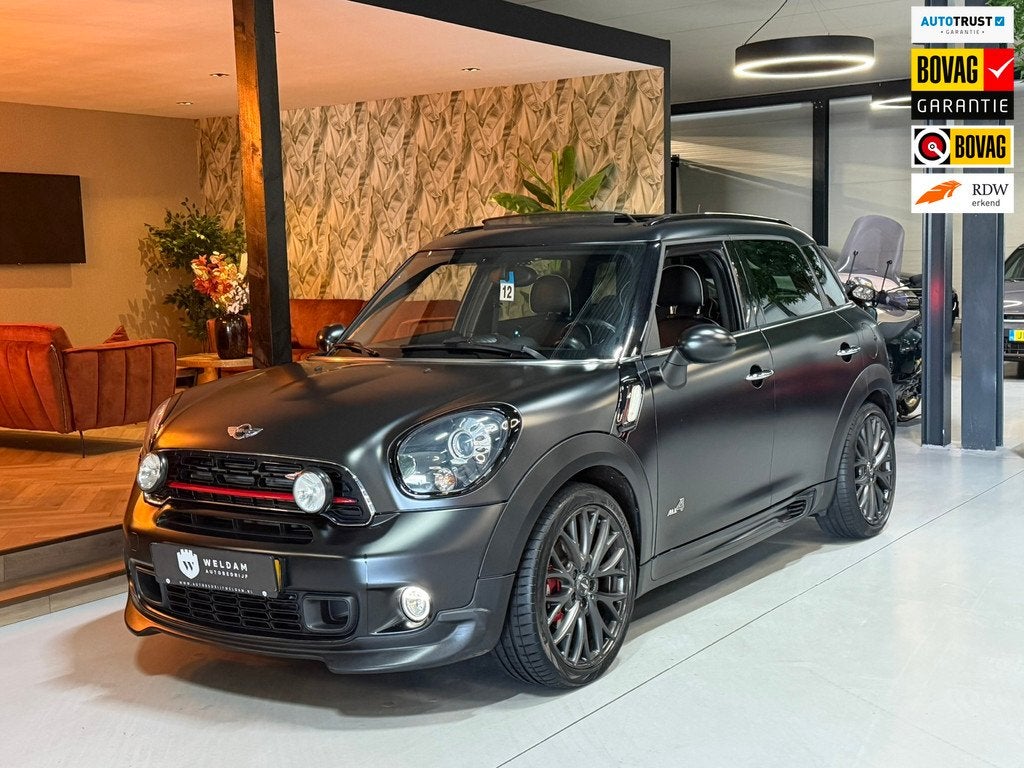 Mini Mini Countryman 1.6 John Cooper Works ALL4 Chili | Pano, Auto's, Mini, Gebruikt, Met garantie (alle), Zwart, Vierwielaandrijving