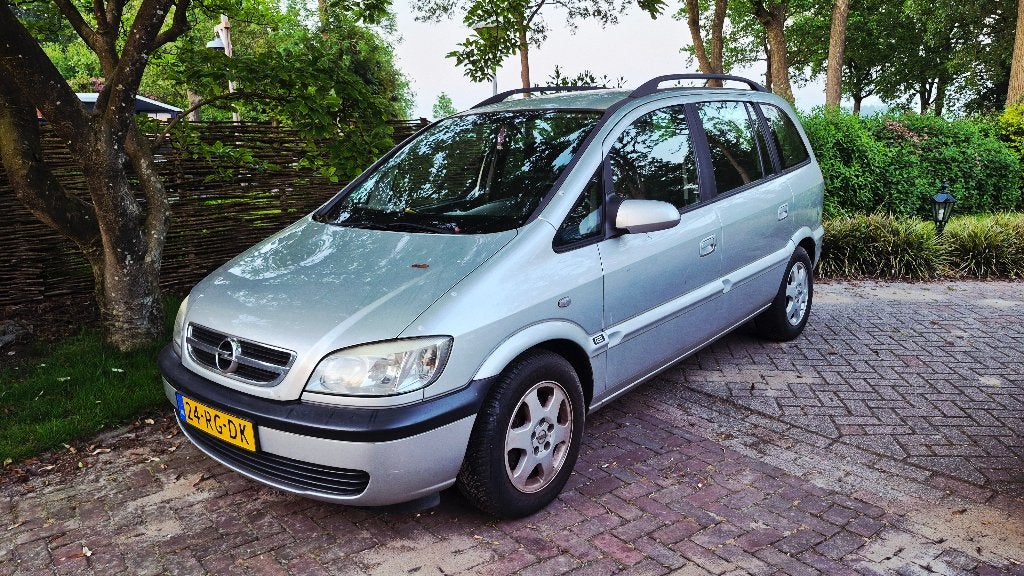 Opel Zafira 1.6 16V 2005 Grijs, Auto's, 4 cilinders, Origineel Nederlands, 1100 kg, 1293 kg